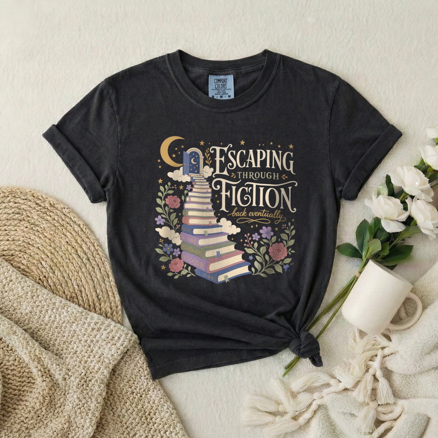 Escaping Into Fiction T-Shirt — Stacked Books & Floral Reading Tee