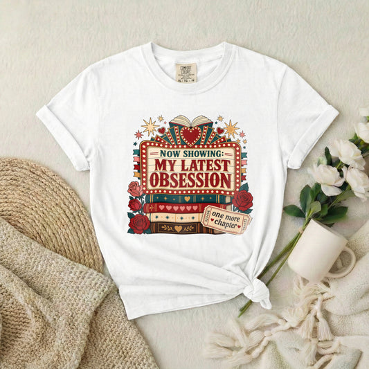 T‑Shirt — "Now Showing: My Latest Obsession" Booklover Tee