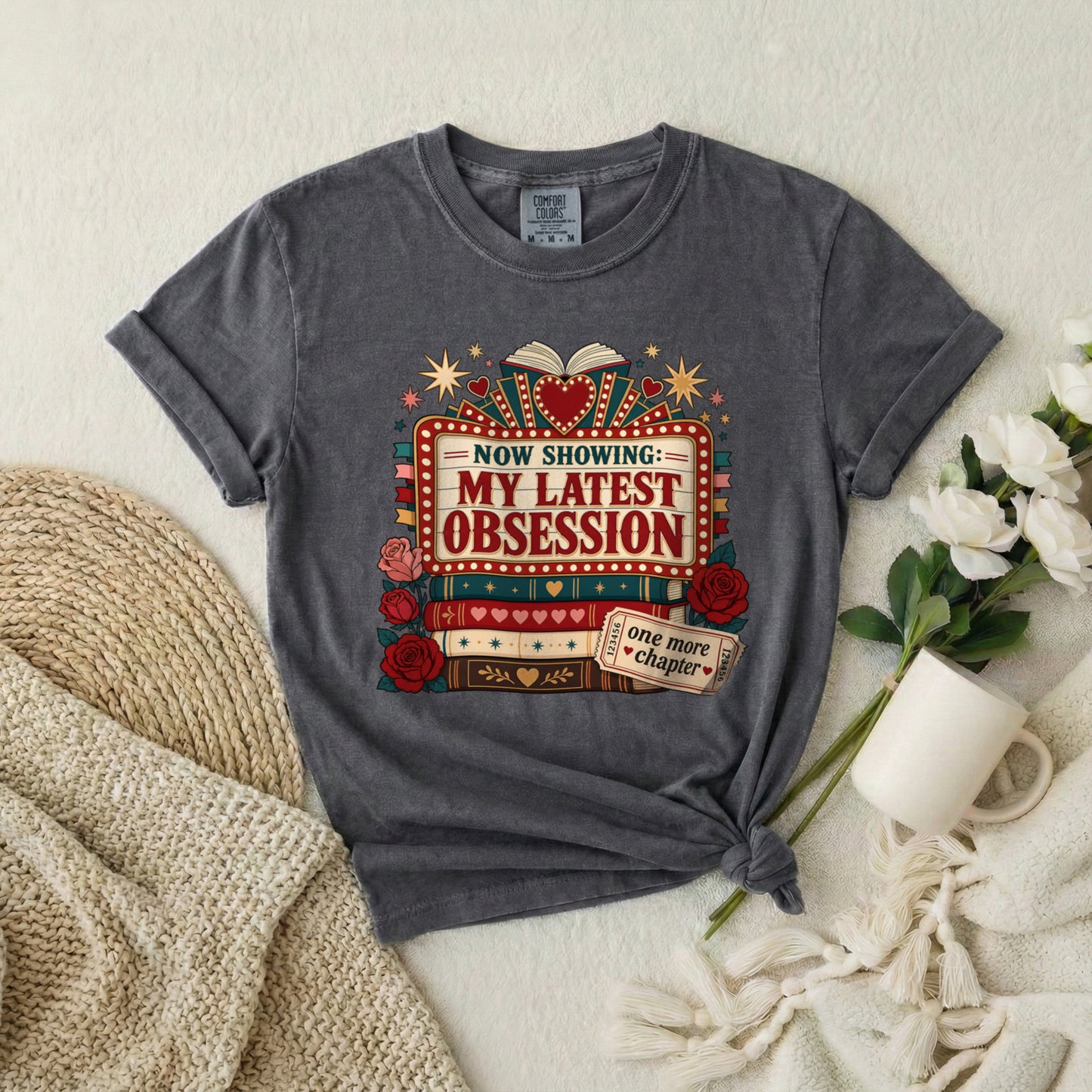 T‑Shirt — "Now Showing: My Latest Obsession" Booklover Tee