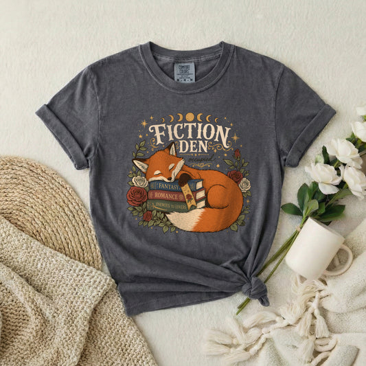 Fiction Den Fox T‑Shirt — Sleeping Fox with Books Cozy Reading Tee