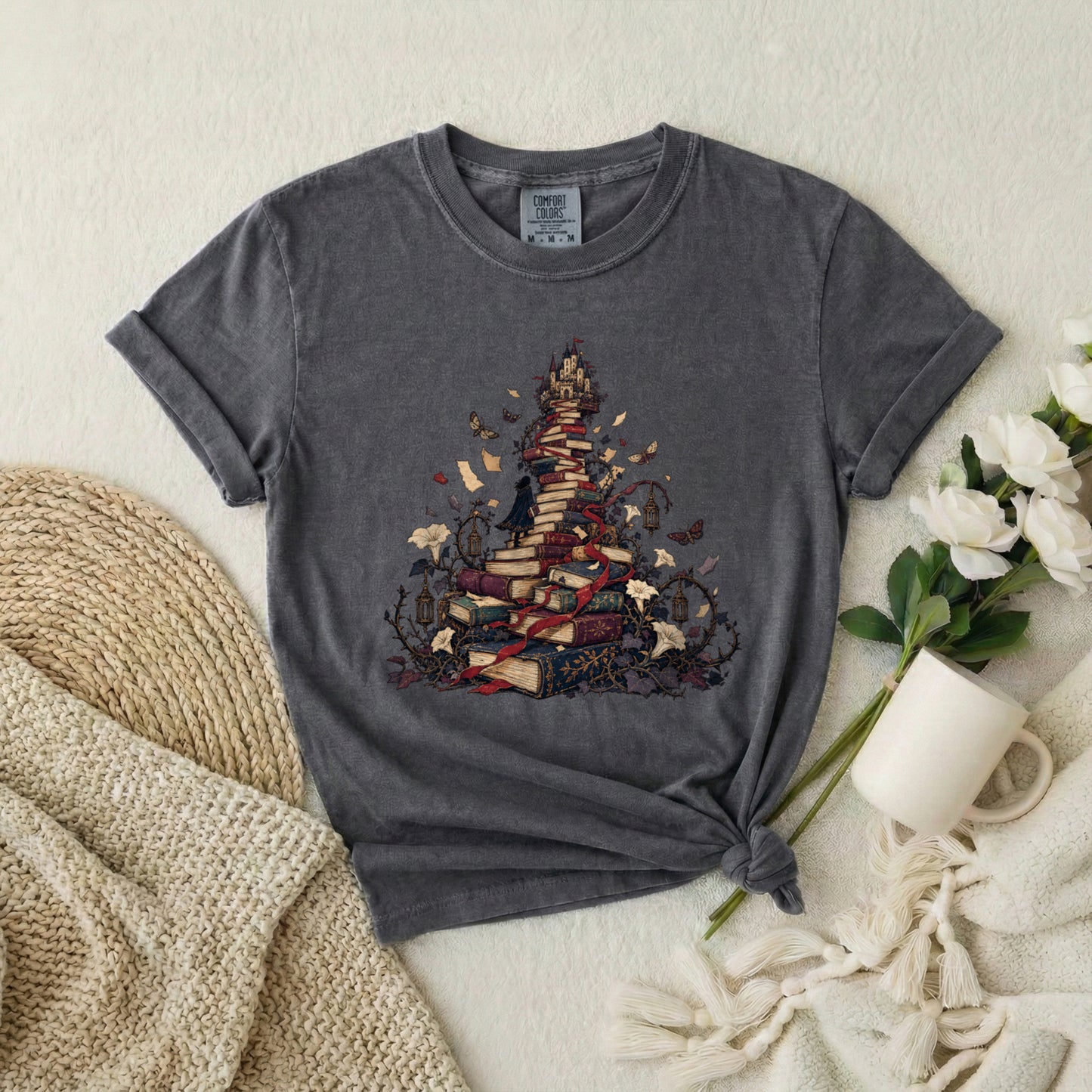 Book Pile Graphic T-Shirt — Stacked Books, Leaves & Flying Pages Tee