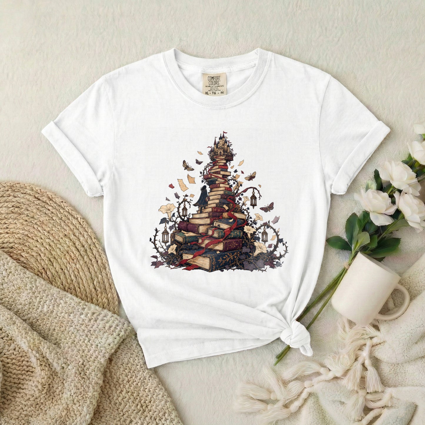 Book Pile Graphic T-Shirt — Stacked Books, Leaves & Flying Pages Tee
