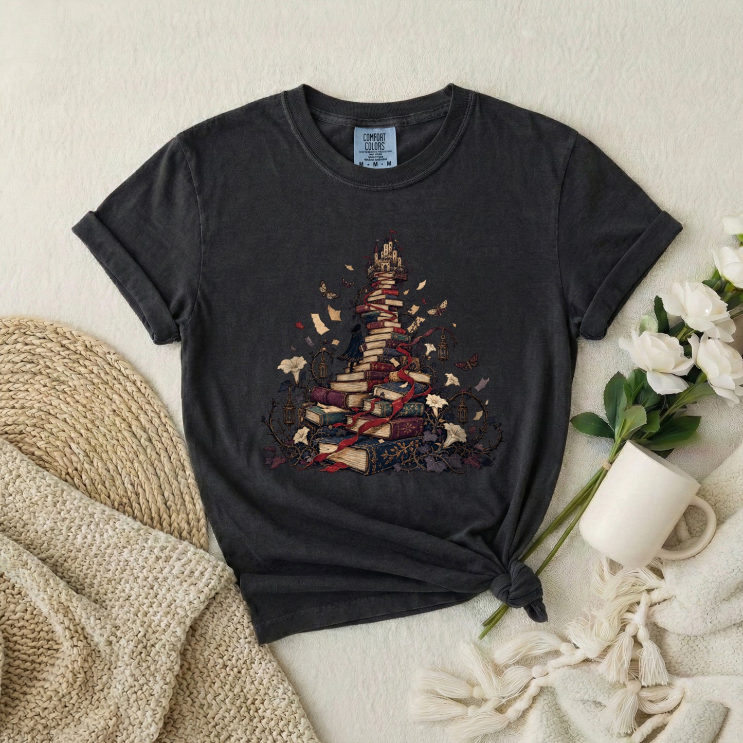 Book Pile Graphic T-Shirt — Stacked Books, Leaves & Flying Pages Tee