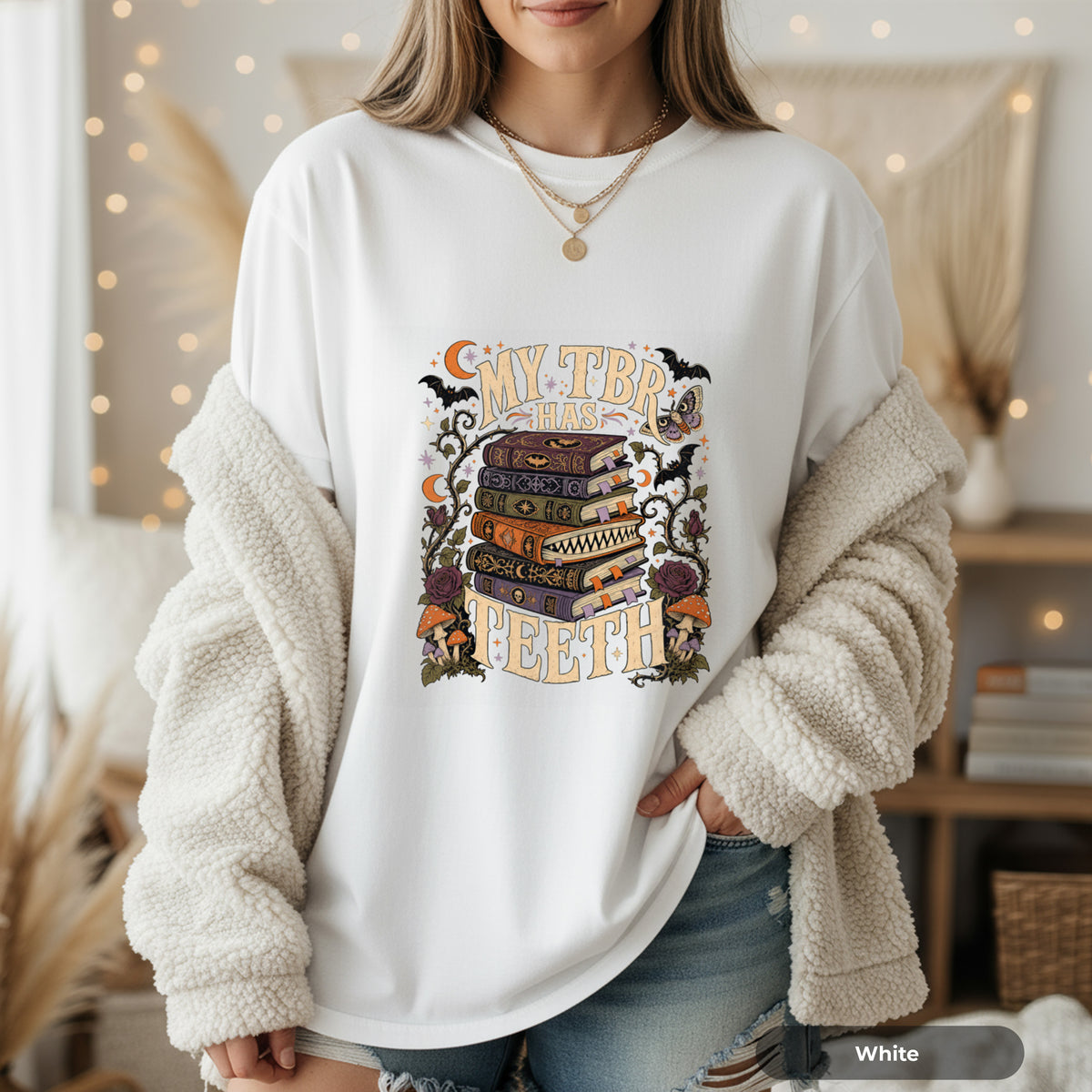 T-Shirt — “My TBR Has Teeth” Stack of Spooky Books Graphic Tee
