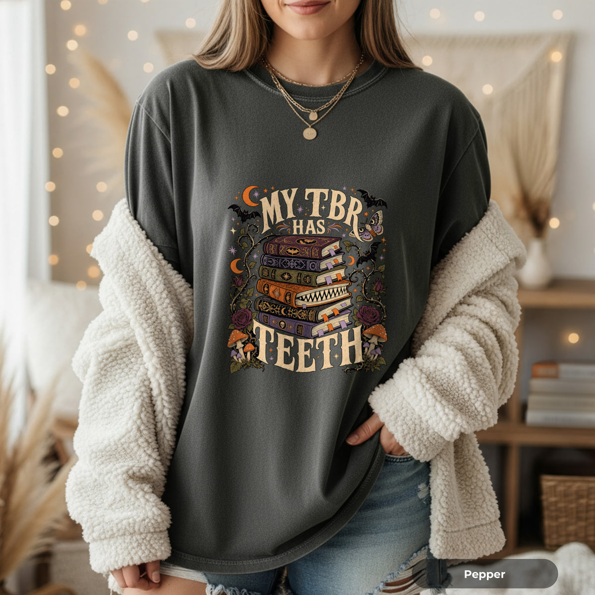 T-Shirt — “My TBR Has Teeth” Stack of Spooky Books Graphic Tee