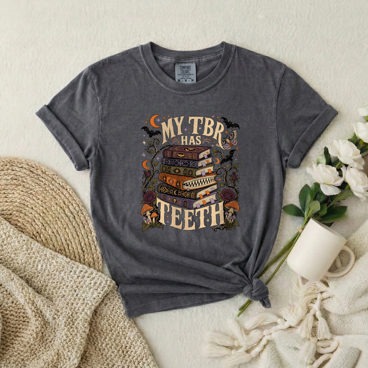T-Shirt — “My TBR Has Teeth” Stack of Spooky Books Graphic Tee