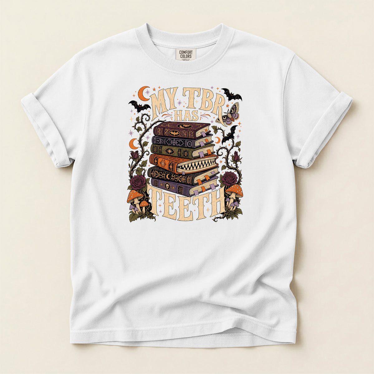 T-Shirt — “My TBR Has Teeth” Stack of Spooky Books Graphic Tee