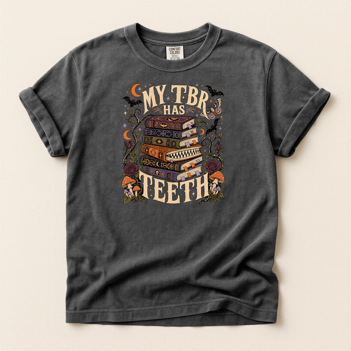 T-Shirt — “My TBR Has Teeth” Stack of Spooky Books Graphic Tee