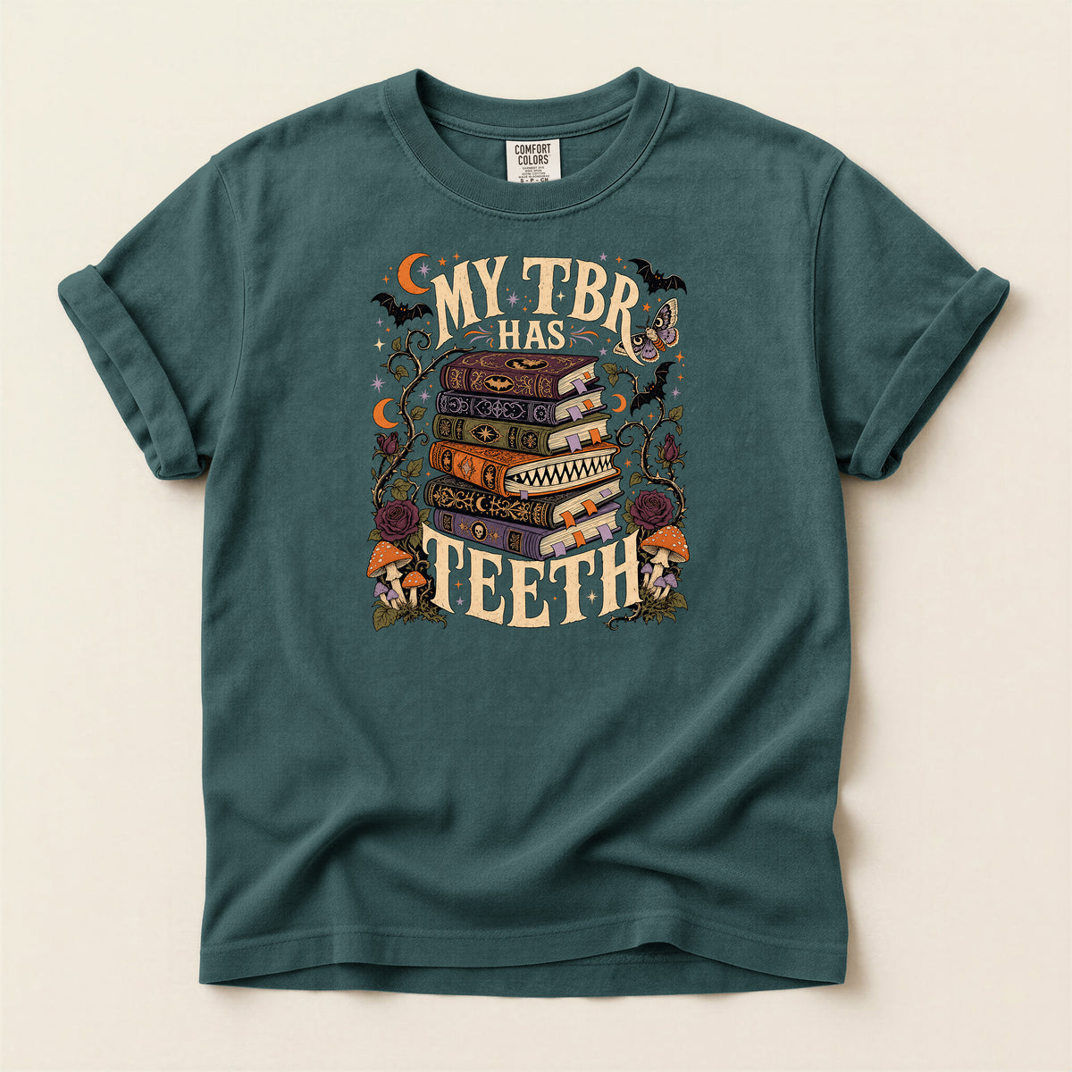 T-Shirt — “My TBR Has Teeth” Stack of Spooky Books Graphic Tee