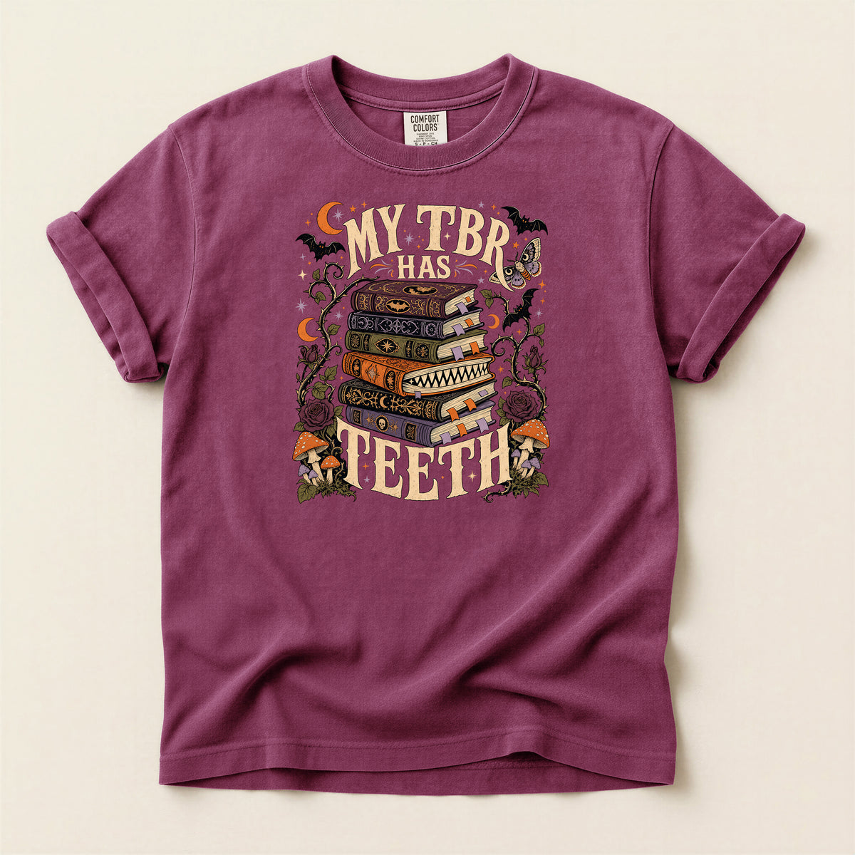 T-Shirt — “My TBR Has Teeth” Stack of Spooky Books Graphic Tee