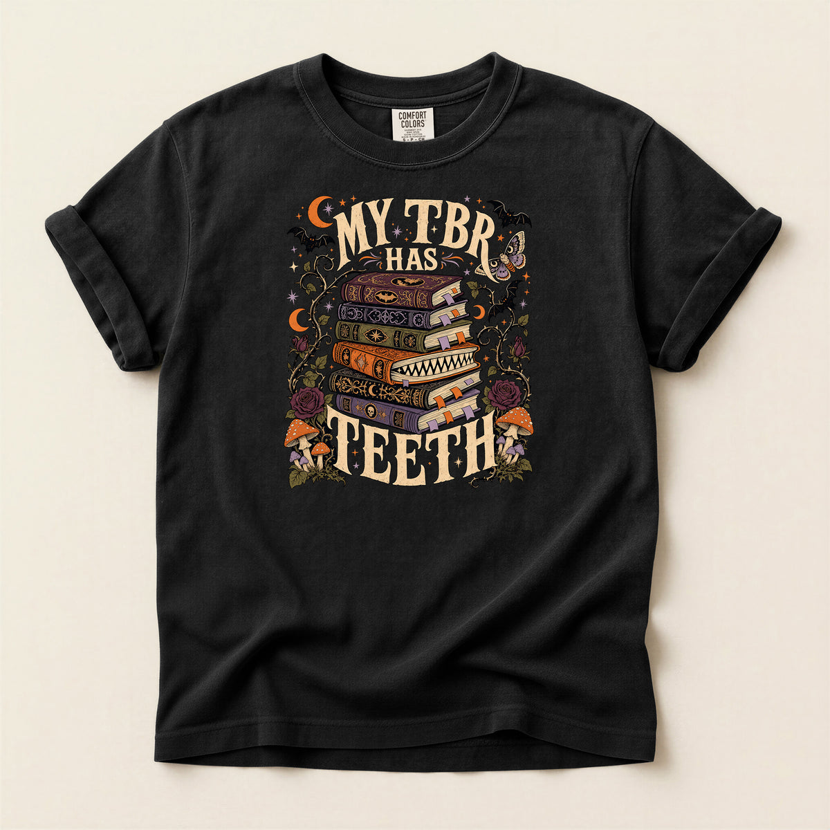 T-Shirt — “My TBR Has Teeth” Stack of Spooky Books Graphic Tee